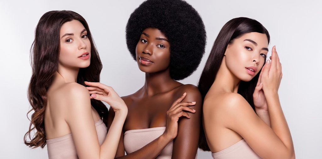 Photo of three woman of different ethnicities with vibrant and refreshed skin